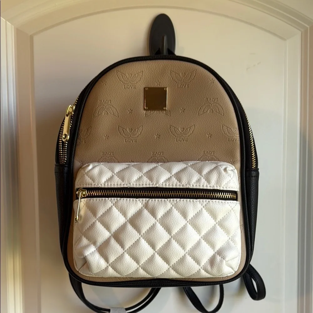 EUC Icing Tan, White, & Black Backpack Purse